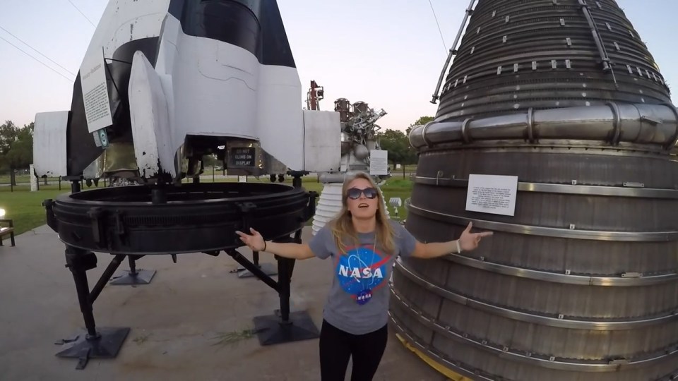  She is also seen striking rapper poses beside huge rockets at the Nasa HQ