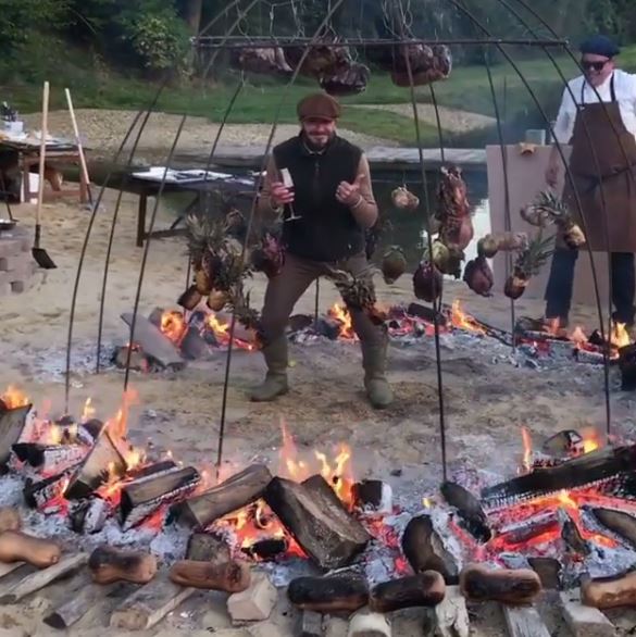  David Beckham gets into the middle of the BBQ