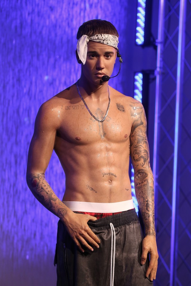 A topless sweaty Justin Bieber caused a frenzy in London today