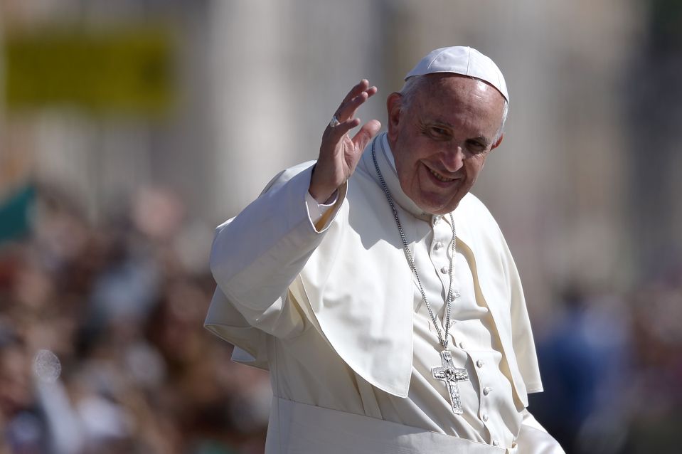 Pope Francis greets the crowd after a mass held at Saint Peter's Square in the Vatican