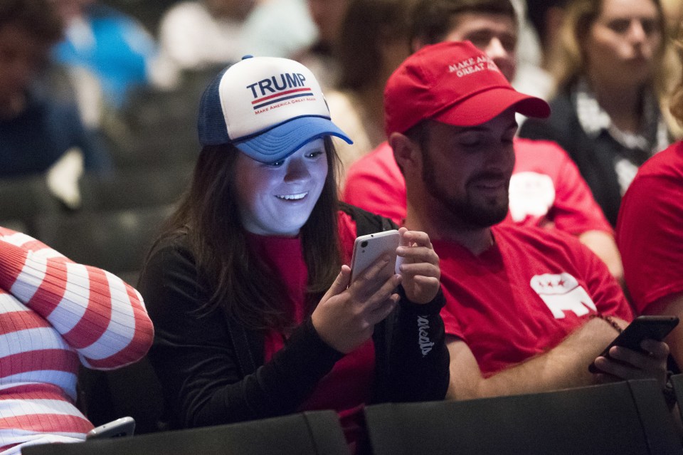 Viewers react as they listen to Republican presidential nominee Donald Trump and Democratic presidential nominee Hillary Clinton during the second Presidential debate