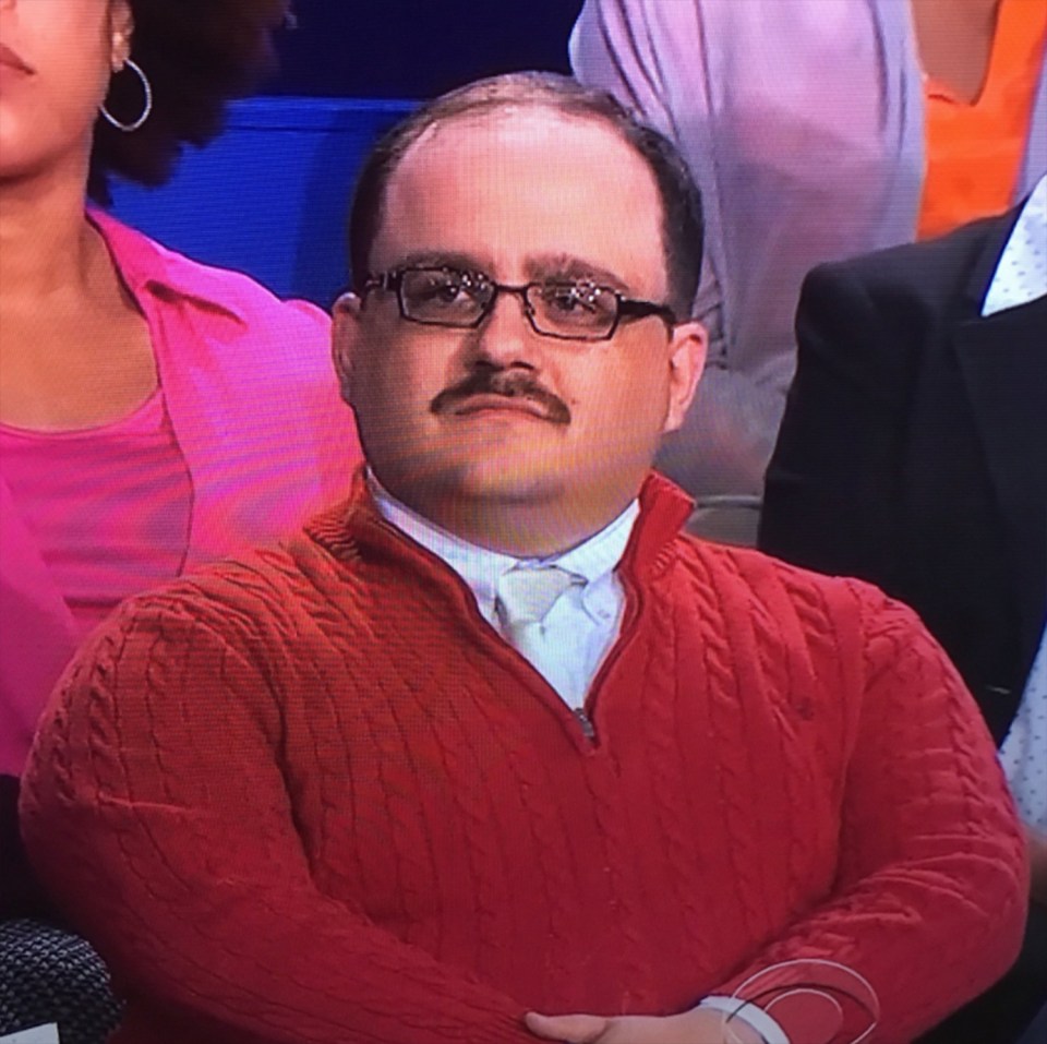 But his dashing mustache, bright red jumper, and striking name, Ken Bone saw him quickly trending on Twitter