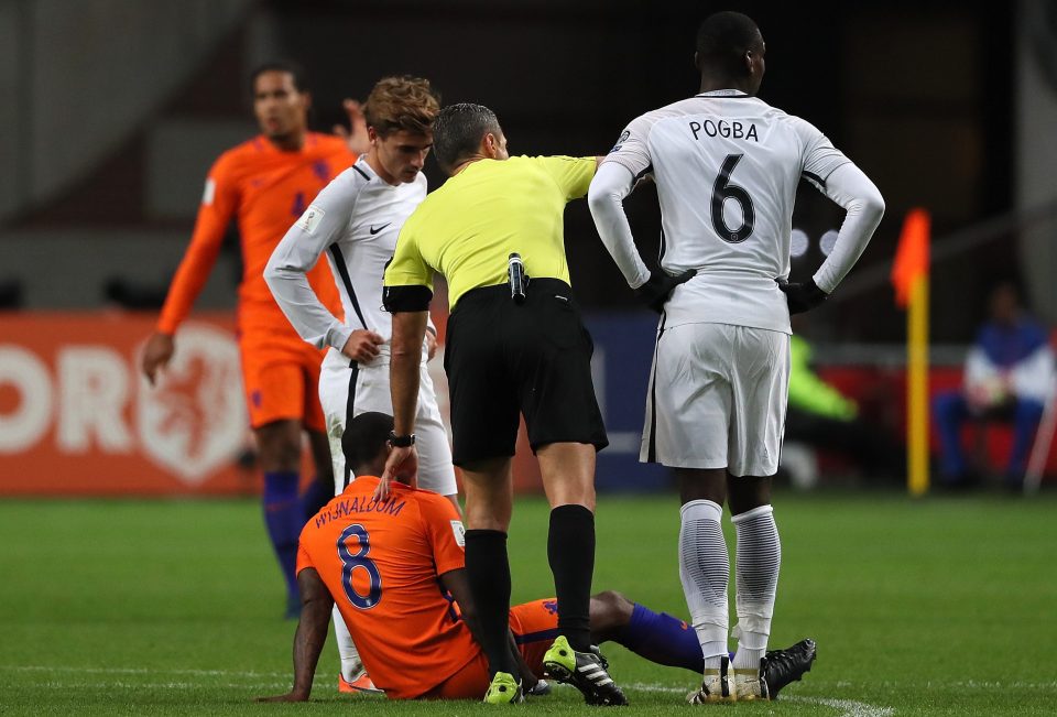  Georginio Wijnaldum slumped to the floor in Amsterdam complaining of a hamstring problem