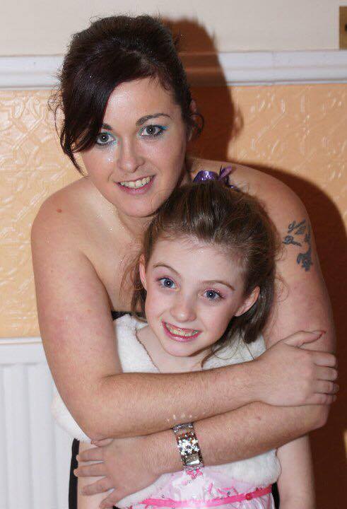  Sharon, aged 10, pictured with her mum Cheryl who found her lying on her bedroom floor convulsing and foaming at the mouth