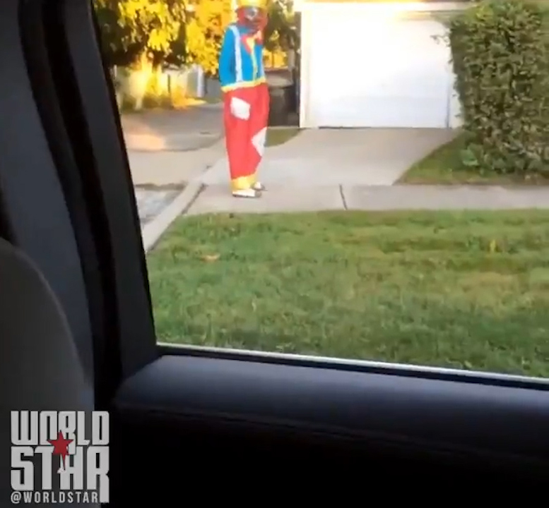  The man spots the clown strolling down the street