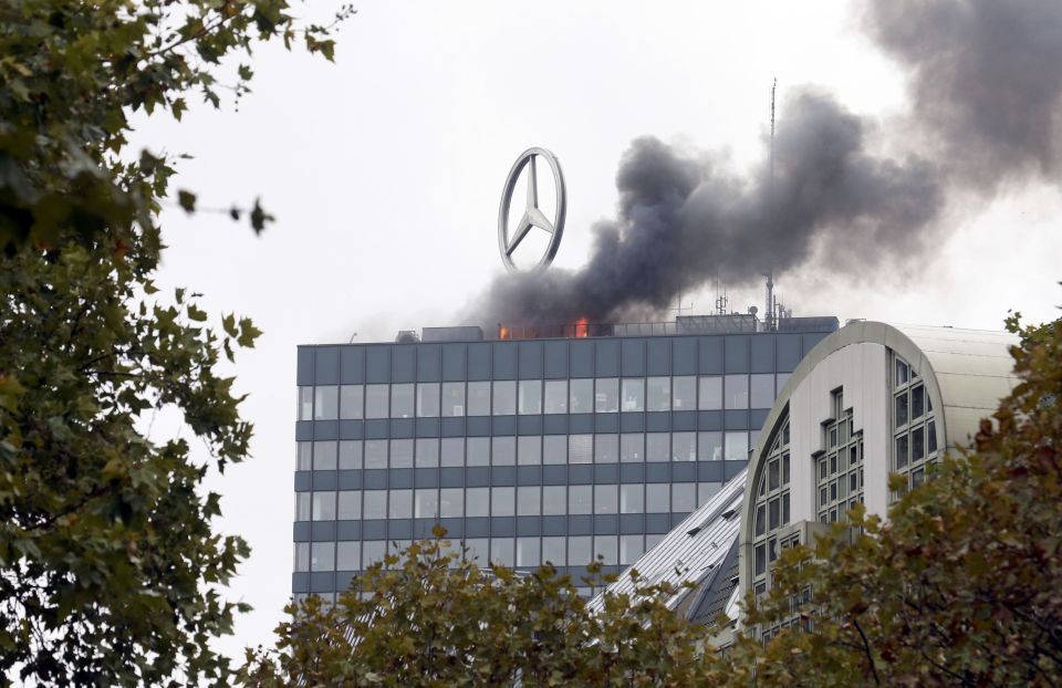  Firefighters are battling a blaze at the top of Berlin's Europa Centre