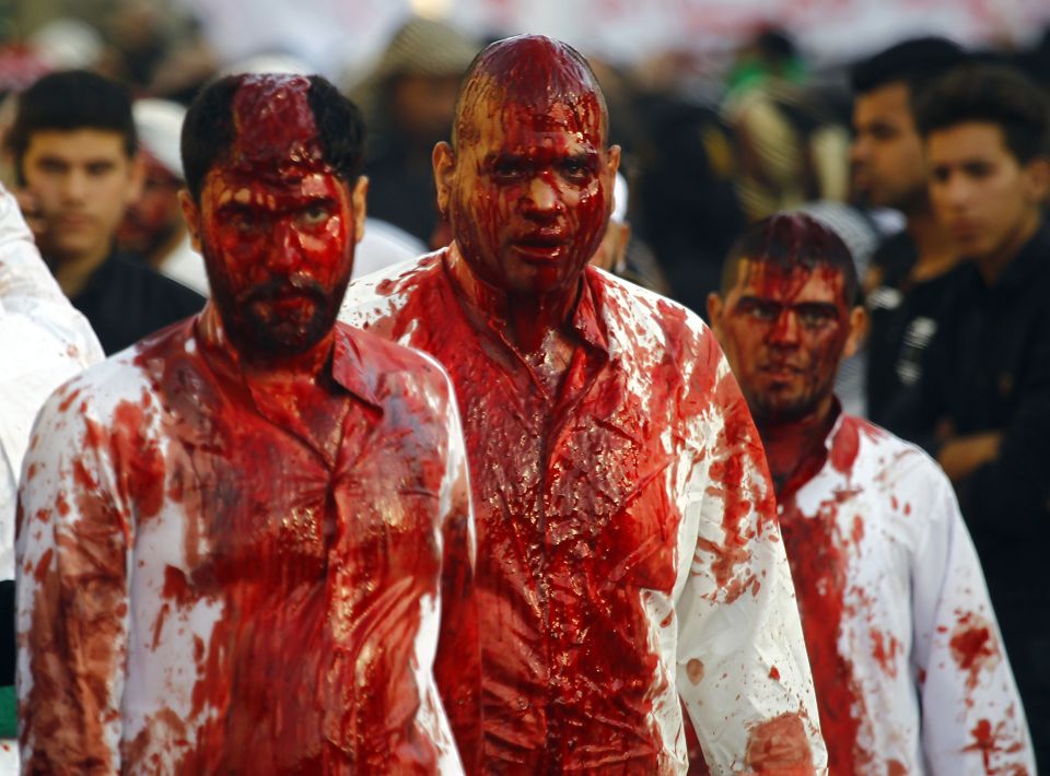  Iraqi Shiite Muslim drenched in their own blood