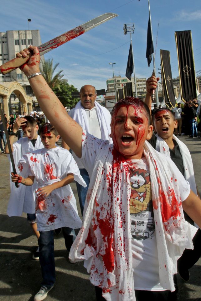  Lebanese Shiite Muslims take part in a flagellation ceremony marking Ashura