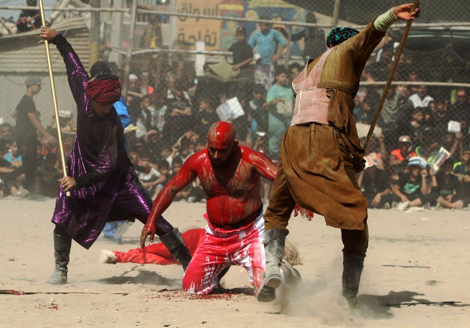  Iraqi Shiite men perform a reenactment of the Battle of Karbala