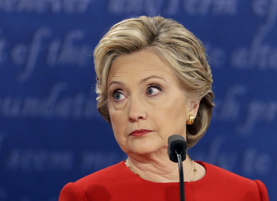  Democratic presidential nominee Hillary Clinton listens to Trump during the first debate