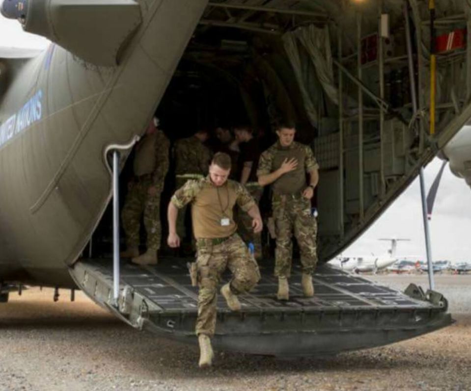  In action . . . Corrie disembarking from transport plane