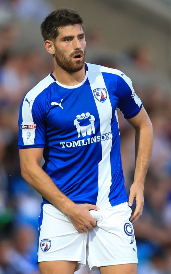  In action . . . Evans playing for Chesterfield as he awaited retrial