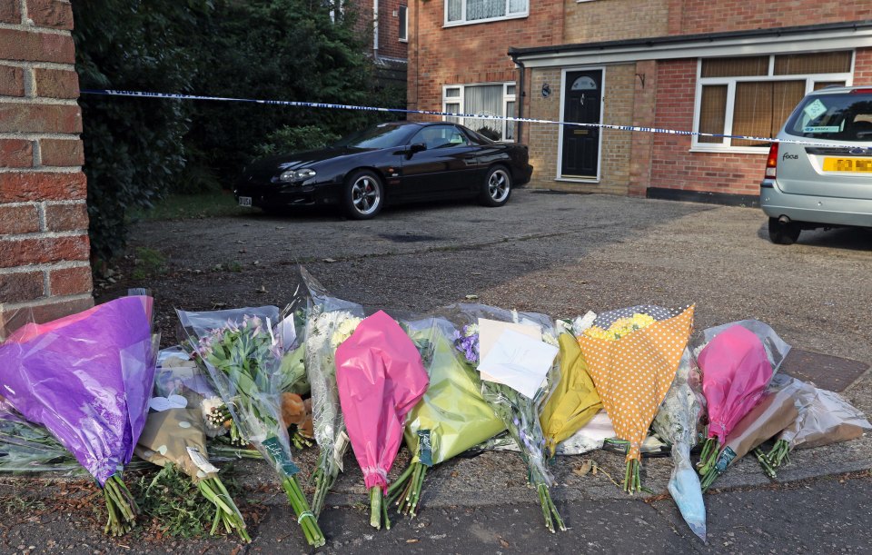  Flowers mark the scene where the tot was tragically mauled to death by dog