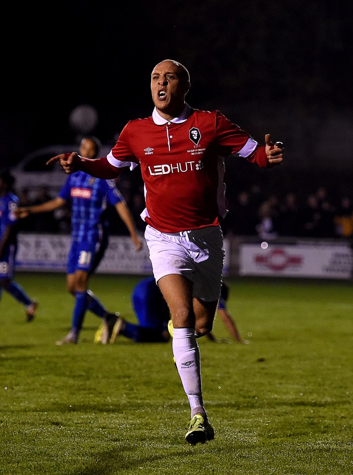 Running for glory . . . Salford City star Richard Allen celebrates scoring in the FA Cup