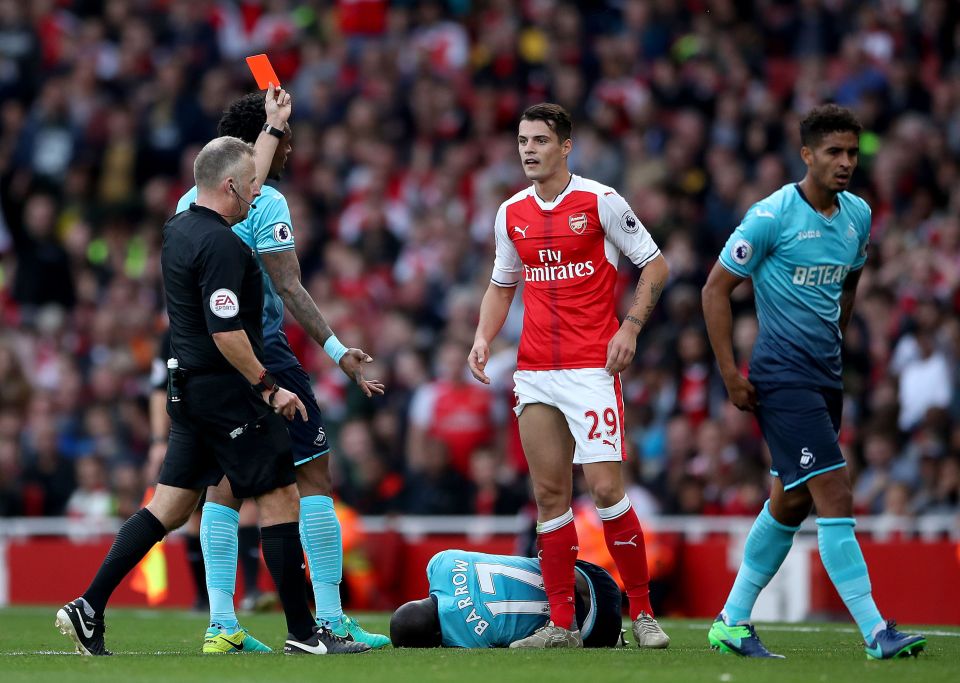  Jon Moss will not officiate any Premier League game this weekend following his decision to show Arsenal's Granit Xhaka a straight red card against Swansea