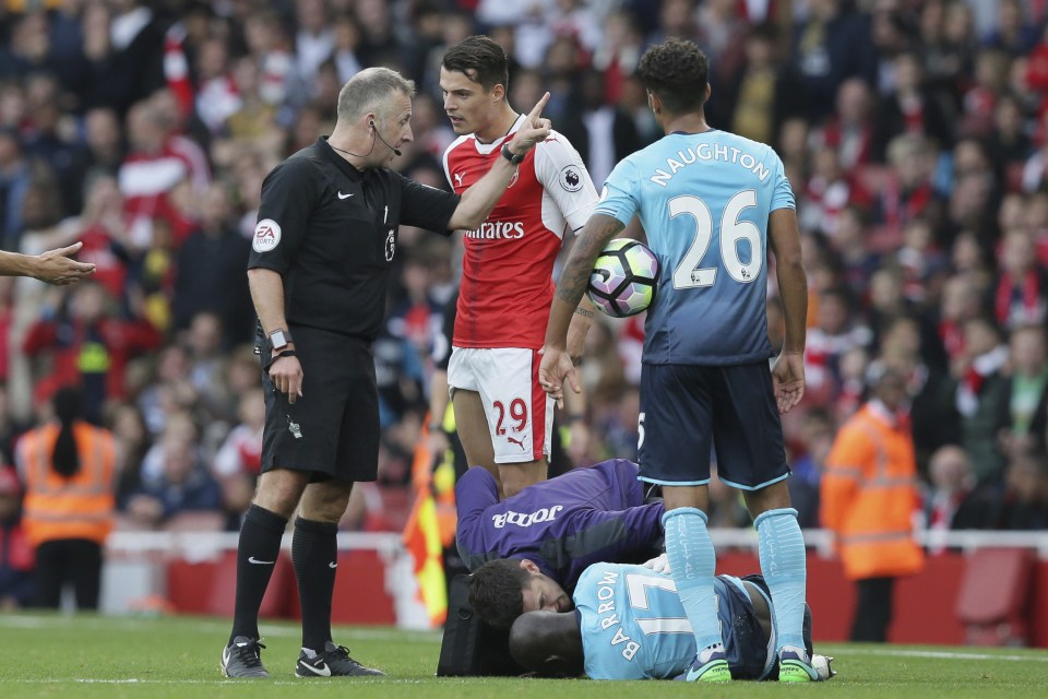  Granit Xhaka made no attempt to play the ball as he caught Modou Barrow