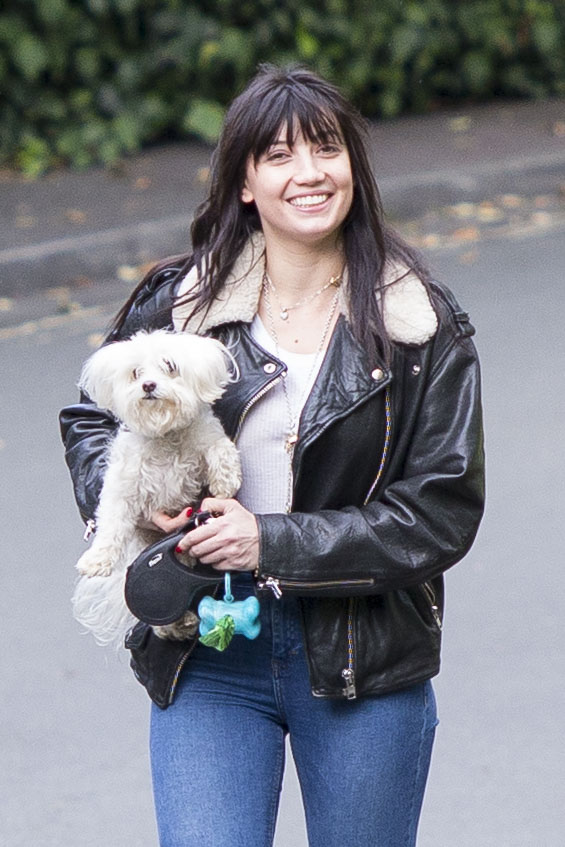  The Strictly star looked perfectly at ease as she and her pet pooch joined the family dog walk