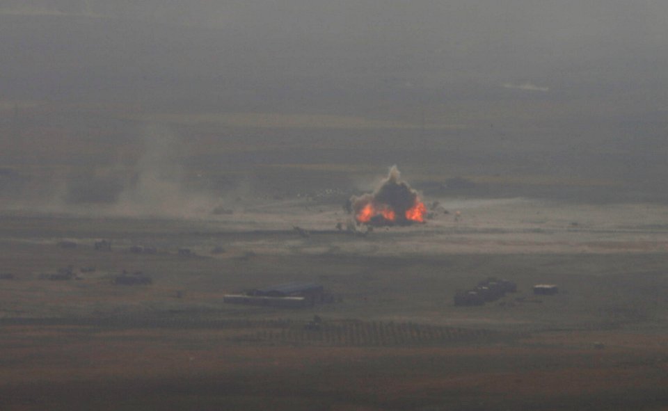 A car bomb attack is seen in the east of Mosul during clashes with Islamic State militants