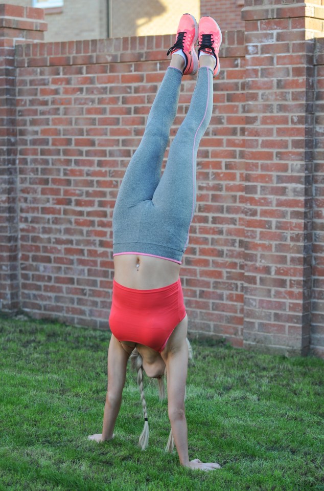  She then showed off her handstands