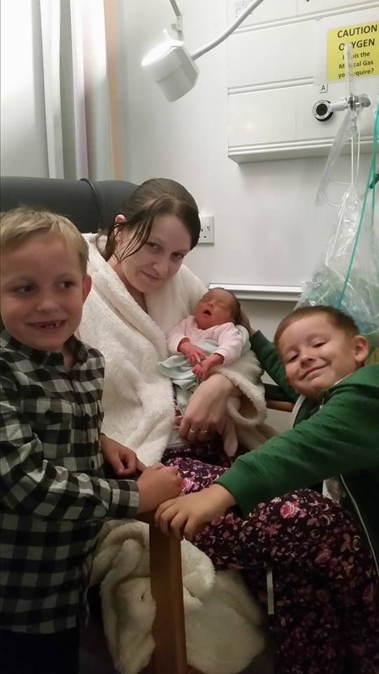 Ashley, pictured with her sons shortly after giving birth to Layla