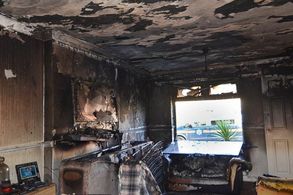  Everything, bar a family photo, is obviously destroyed after the fire ripped through the home