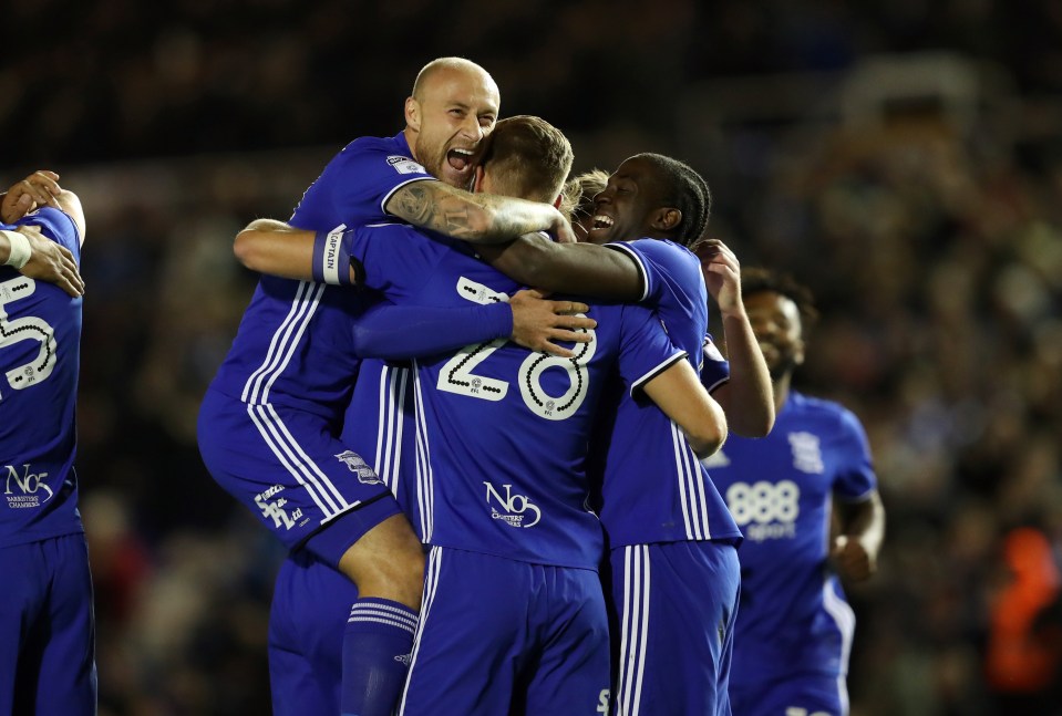  Birmingham City's Michael Morrison is mobbed by his team-mates after scoring against Rotherham