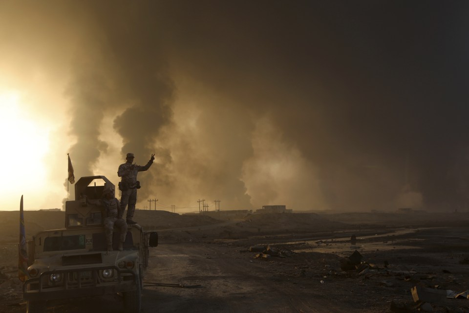 Smoke rises from Islamic state positions after an airstrike by coalition forces in Mosul, Iraq, Tuesday