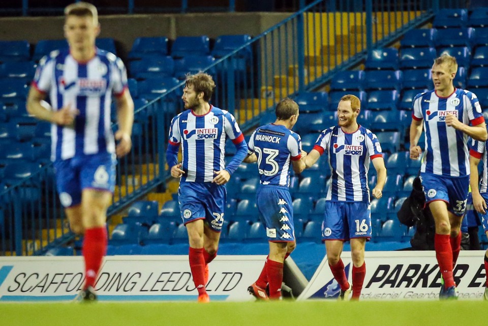  Wigan Athletic's Shaun MacDonald celebrates scoring the equaliser against Leeds