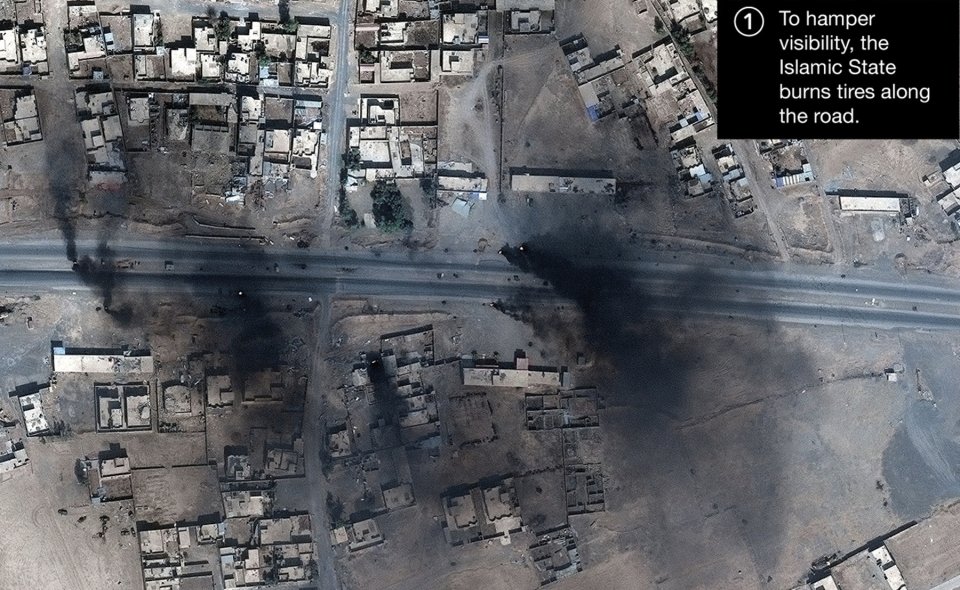 Aerial photographs show the smoke emanating from the city after tyres and oil drums were set alight