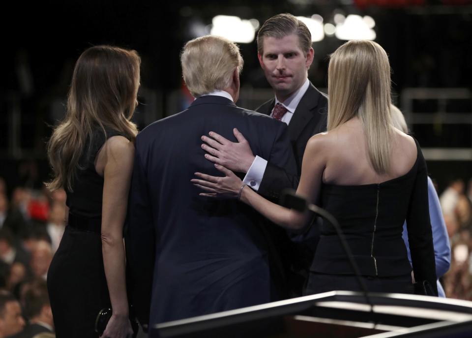 Trump greets his family, wife Melania, his son Eric and his daughter Ivanka after the third and final 2016 presidential campaign debate at UNLV in Las Vegas