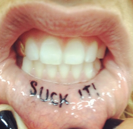  On Instagram, the Tik Tok singer revealed she'd inked these two words on the inside of her mouth