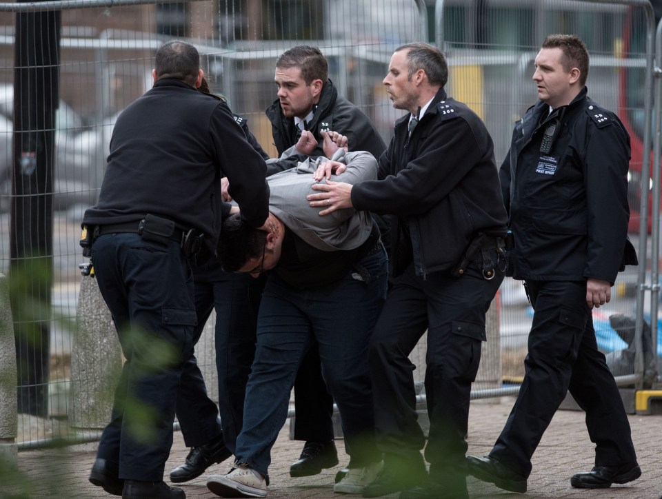 Syrian doctor Abdul Kader al-Zuebi arrested at the Lunar House immigration center, Croydon.