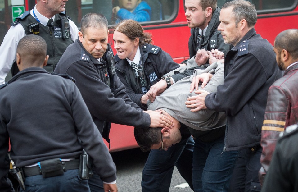 Syrian doctor Abdul Kader al-Zuebi arrested at the Lunar House immigration center, Croydon.