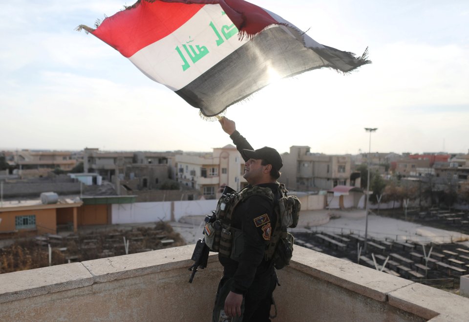  An Iraqi flag has replaced the jihadis' standards