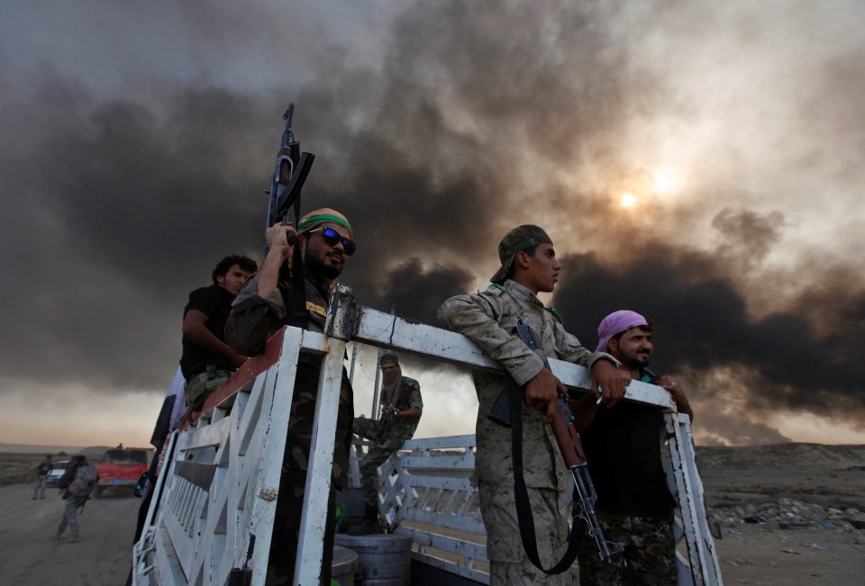  Iraqi pro-government forces are seen in Qayyara, Iraq, October 22