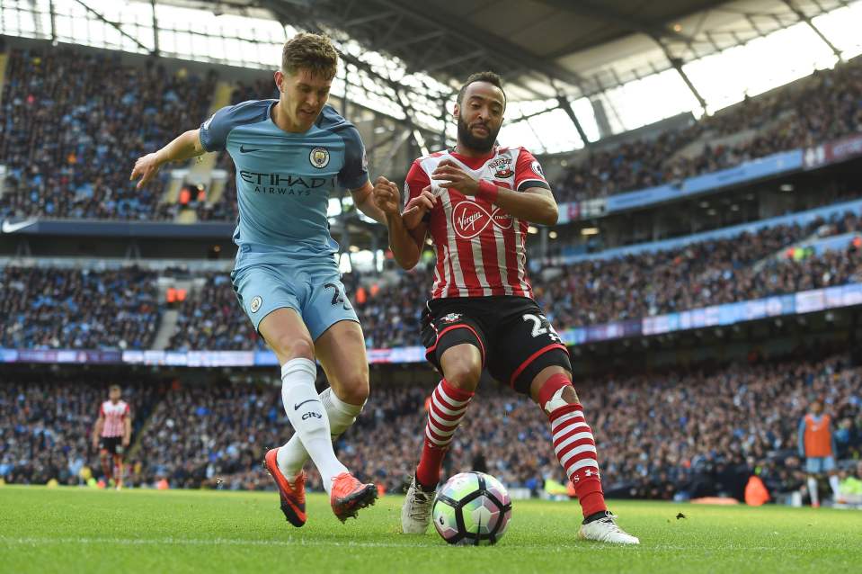 Nathan Redmond (r) vies with gaffe-prone John Stones during the two sides' draw on Sunday