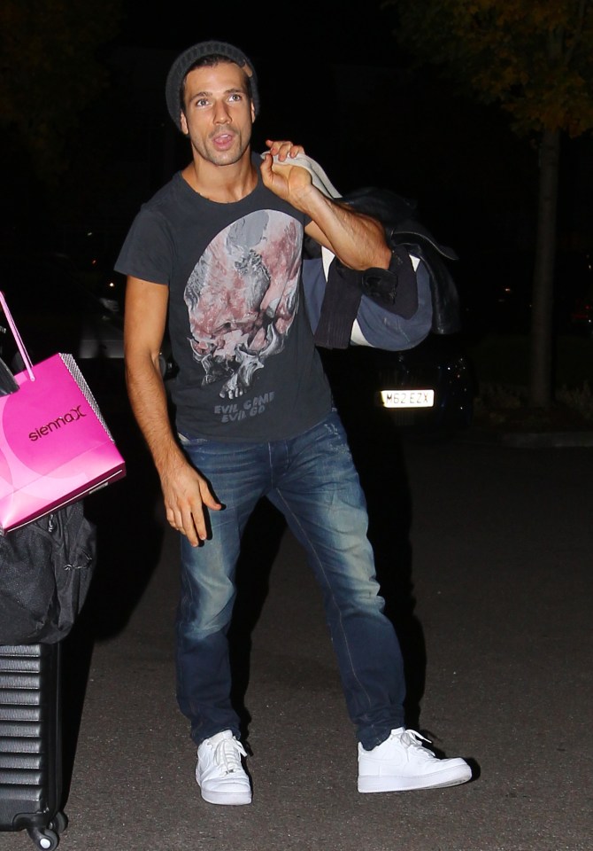  Hollyoaks hunk Danny Mac lugged his bags inside