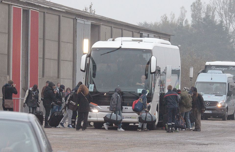  Migrants are being processed and put on busses out to new asylum centres across France