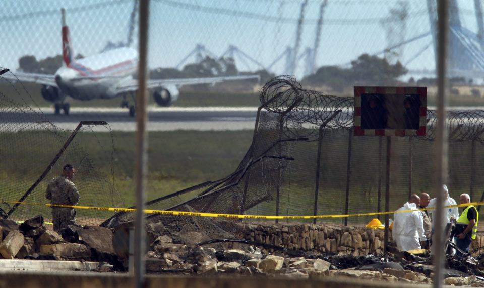  The crash scene was cordoned off today as investigators worked at the scene