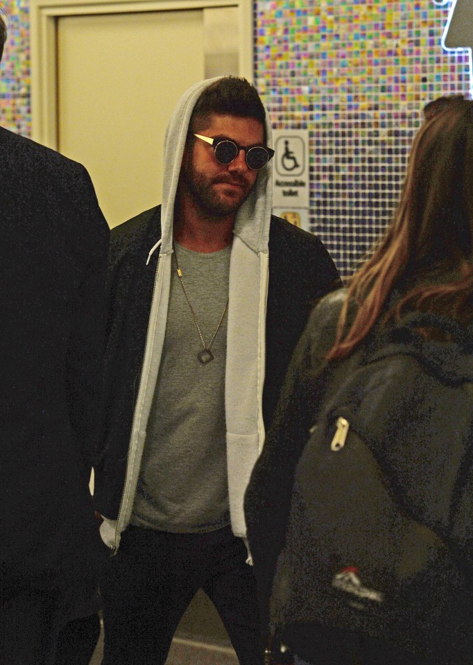 Her ex boyfriend Alex Mytton looked a little jet lagged