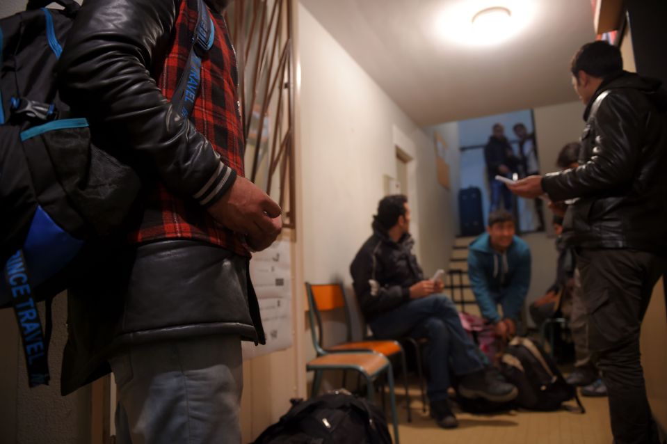 Some migrants have already arrived at processing centres, such as this one in Nogent-le-Rotrou, over 200 miles from Calais