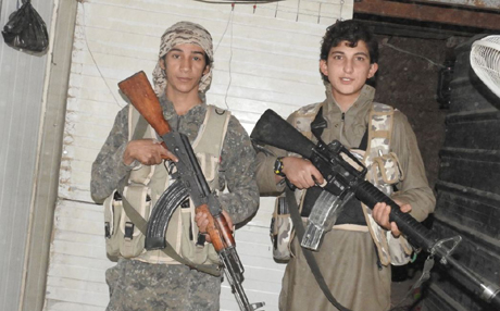  The young jihadis are dwarfed by their weapons