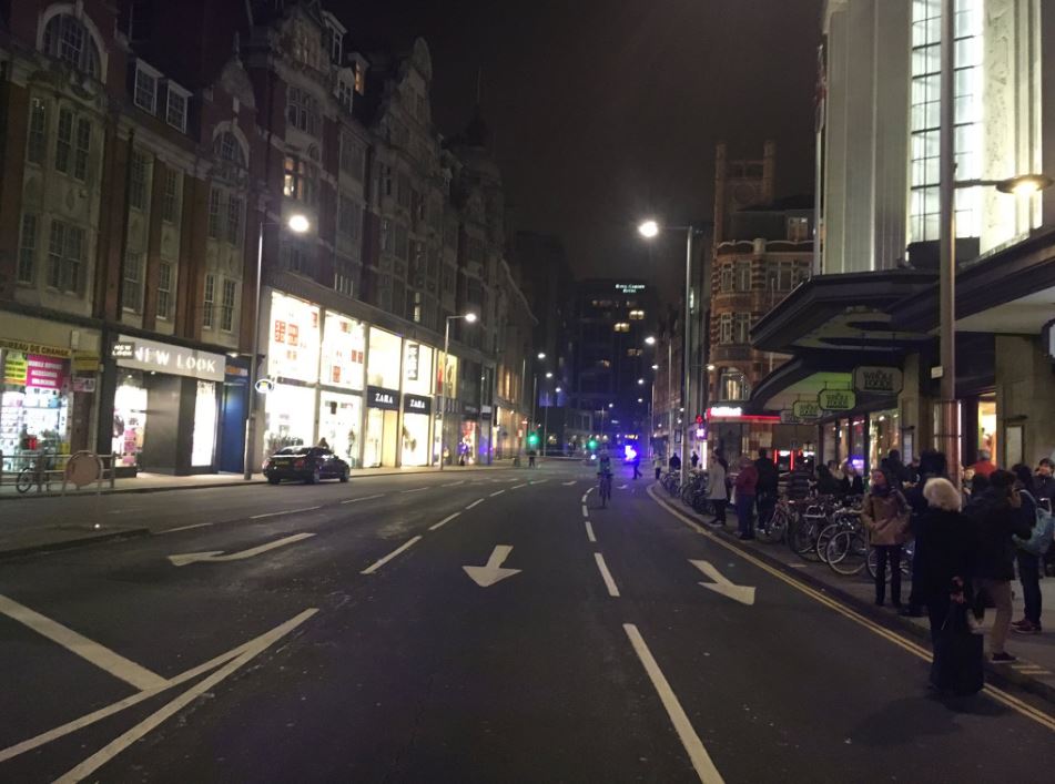 Crowds line the streets after they were turfed out of shops and restaurants on a Friday evening