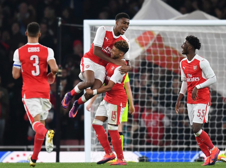 Chamberlain is jumped on by Alex Iwobi as he hits Arsenal in to the lead 