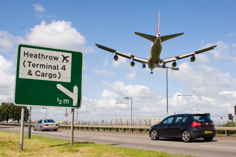 Road sign and highway near Heathrow Airport