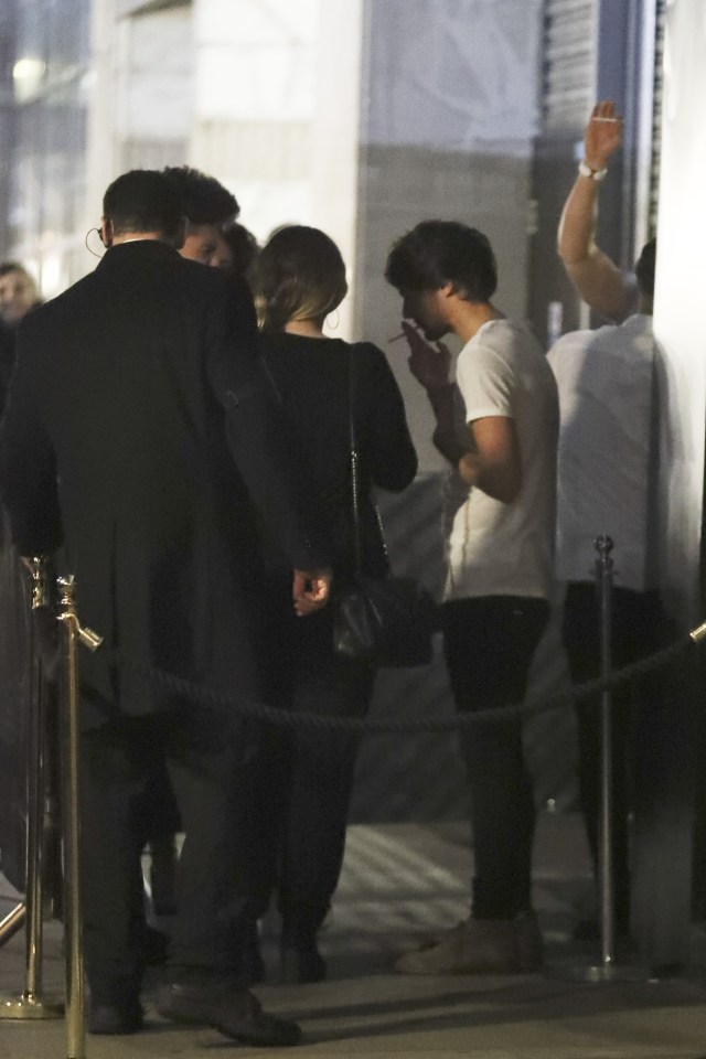  Louis slipped out the party for crafty cig