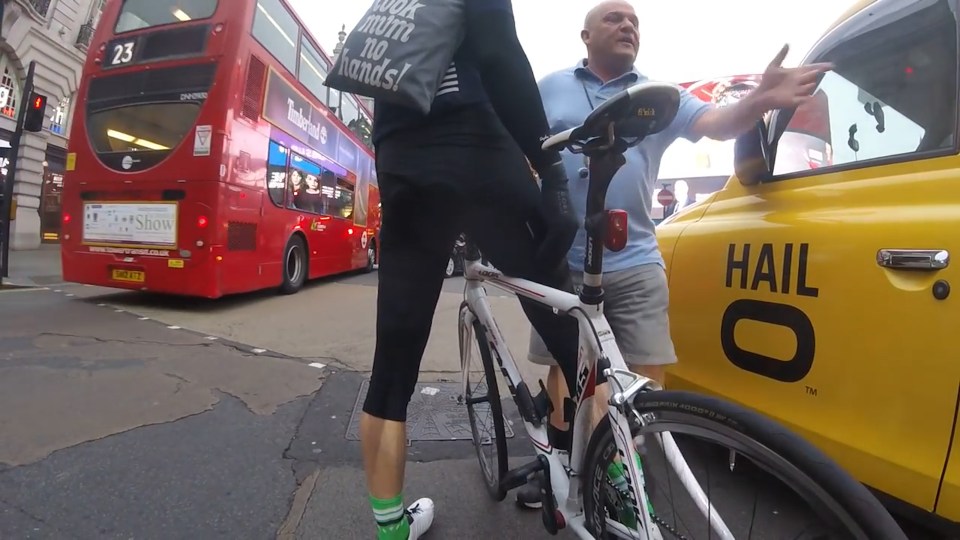  Holdsworth claims the cabbie overtook the cyclist, cutting him off before storming out of the motor