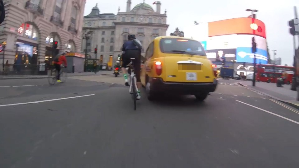  Video footage has emerged of a black cab driver launching a foul-mouthed tirade against a cyclist on Picadilly Circus