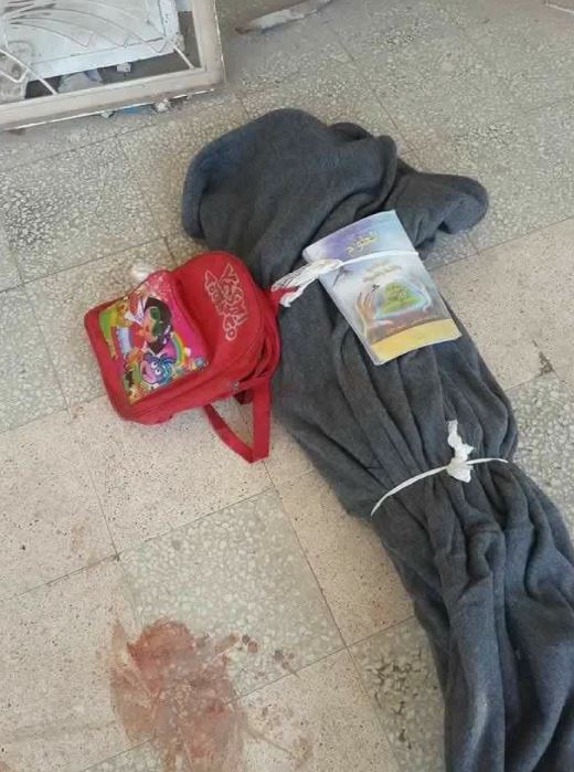  The lifeless body of a child after the airstrike attack on a school in Hass