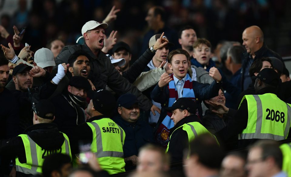  West Ham fans taunt Chelsea supporters during Wednesday's cup tie